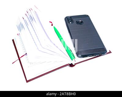 Weekly and mobile phone on a white background. Business. Work. Place for text. Background image. Template. Stock Photo