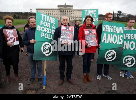 Sinn Fein activists calling for a border poll, stage a demonstration outside Parliament Buildings, Stormont, Belfast, ahead of the UK leaving the European Union at 11pm on Friday. Stock Photo