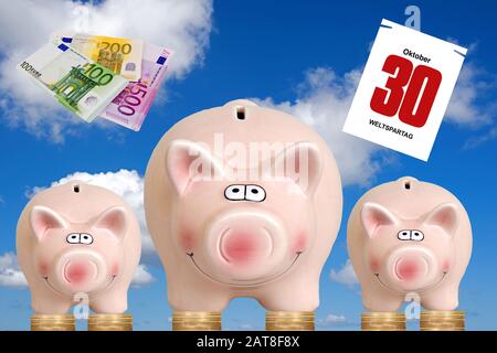 three piggybanks standing on Euro coins, composing with banknotes and calendar sheet dated 30.10., World Savings Day Stock Photo