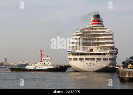 Asuka II cruise ship departing Yokohama Port in Kanagawa, Japan Stock Photo