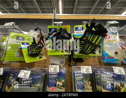 Orlando, FL/USA-1/29/20: A display of various brands of pet muzzles and leashes for sale at a Petsmart Superstore ready for pet owners to purchase for Stock Photo