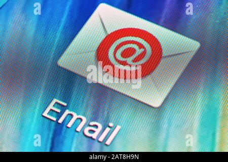 BUENOS AIRES, ARGENTINA - JULY 18, 2019: Email application icon on mobile phone touch screen (Android device). Macro shot. Stock Photo
