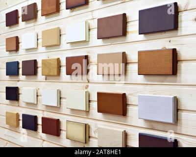 Samples of wood panels for furniture on stand store Stock Photo