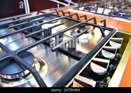 Modern gas stoves on display in the store Stock Photo