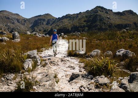 Caucasian woman enjoying time in the mountain Stock Photo
