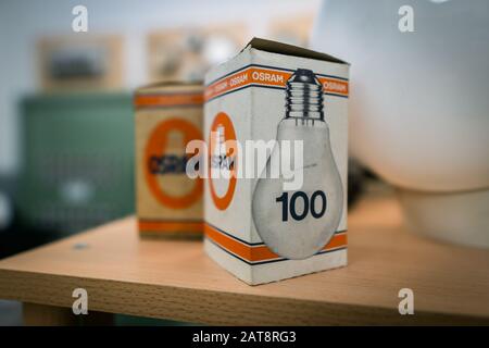 Augsburg, Germany - January 25, 2020: two old Osram boxes on a wooden shelf Stock Photo