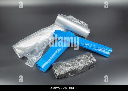 Rolls of plastic bags on a dark background. Stock Photo