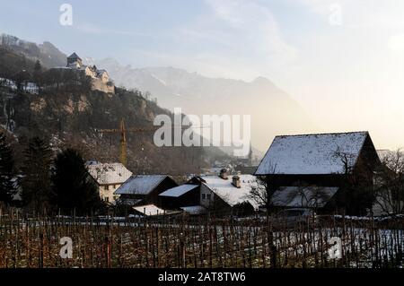 View of the Schloss of Vaduz from the small vin yards in Vaduz   The castle is the Royal residence of Liechtenstein built on a high cliff overlooking Stock Photo