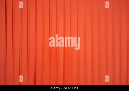 Red zinc texture wall,metal floor. Red tile roof floor background. Closeup roofing texture Stock Photo