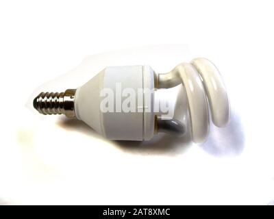 Energy-saving light bulb on a white background.  Stock Photo