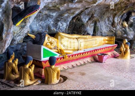 Reclining Buddha at the Elephant Cave in Vang Vieng, Laos. Stock Photo