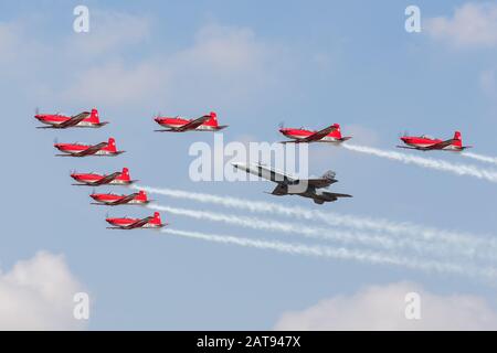 Swiss Air Force F/A-18C Hornet and PC-7 Aerobatic team pictured at the 2018 Royal International Air Tattoo at RAF Fairford in Gloucestershire. Stock Photo