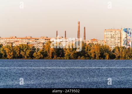 Left side of Dnipro city, Ukraine. Panoramic view of Dnipro river. Cityscape Housing estate Sunny Mural artwork is painted by Artist Olexander Brytcev Stock Photo