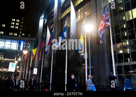 Brussels, Belgium. 31st Jan, 2020. Staff members take down the United Kingdom's flag from outside the European Parliament building in Brussels on Brexit Day. Credit: ALEXANDROS MICHAILIDIS/Alamy Live News Stock Photo