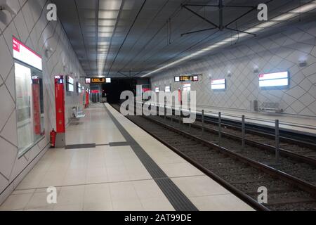 An underground metro station in Dusseldorf, Germany. The platform empty. Stock Photo