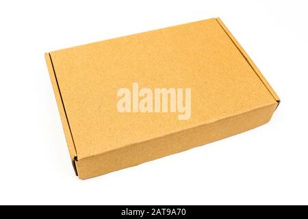 One closed rectangular cardboard box isolated on white background Stock Photo