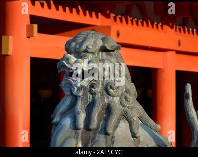 Guardian Lion Statue at Itsukushima Shrine on the Itsukushima (Miyajima) island in Hiroshima Prefecture, Japan. Stock Photo