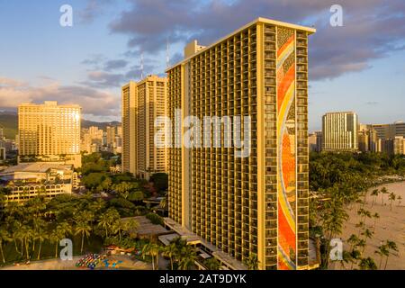 Waikiki, HI - 19 January 2020: Aerial view of the rainbow tower at the front of Hilton Hawaiian Village on Waikiki beach in Hawaii Stock Photo