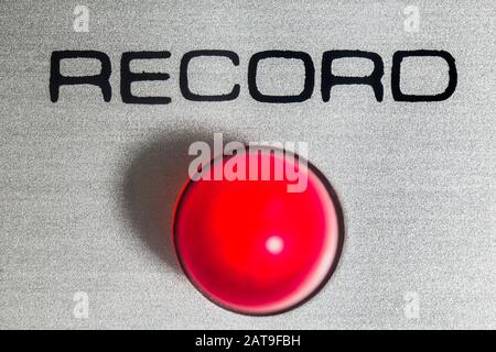 Macro close up photograph of record light on vintage eight track stereo tape machine. Stock Photo