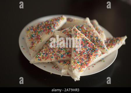 a Close up plate of fairy bread, Australian traditional treat bread buttered and then sprinkled with sprinkles Stock Photo