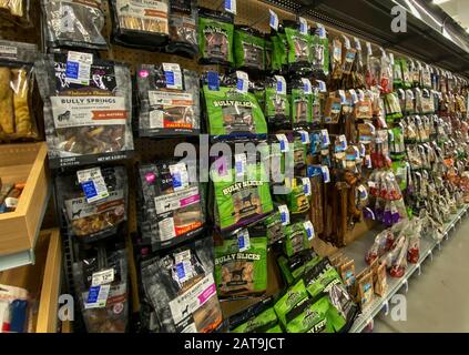 Orlando, FL/USA-1/29/20: A display of pet treats for sale at a Petsmart Superstore ready for pet owners to purchase for their pets. Stock Photo