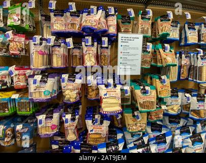 Orlando, FL/USA-1/29/20: A display of pet treats for sale at a Petsmart Superstore ready for pet owners to purchase for their pets. Stock Photo