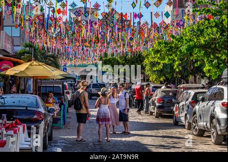 Vistiors taking selfies in Sayulita, Riviera Nayarit, Mexico. Stock Photo