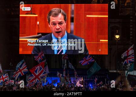 Parliament Square, Westminster, London, UK. 31st Jan, 2020. On the day that the UK is set to leave the European Union a celebration event took place outside Parliament led by Leave Means Leave. Beginning at 9pm the party welcomed in the official withdrawal time set at 11pm. A large video screen ran pieces from the history of Brexit Stock Photo