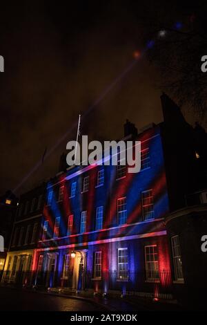 London, UK. 31 January, 2020. Red, white and blue lights are projected onto 10 Downing Street in the moments after the UK left the European Union. Credit: Mark Kerrison/Alamy Live News Stock Photo