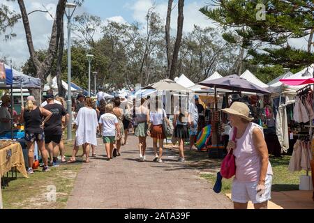 People shopping on a summers day at Byron Bay weekend market,Australia Stock Photo