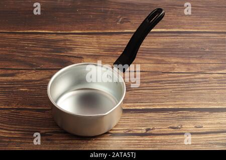 Indian made Aluminum cooking pan isolated on white background Stock Photo