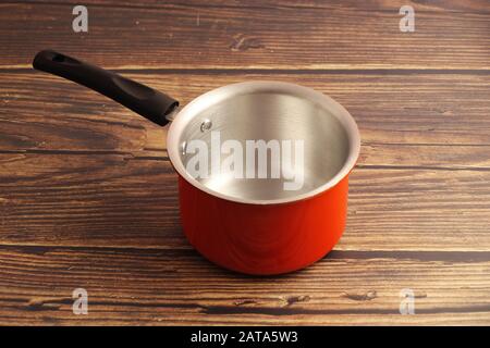 Indian made Aluminum cooking pan isolated on white background Stock Photo
