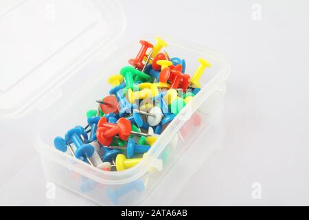 Metal push pins on white background Stock Photo