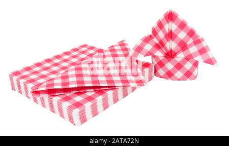 Red gingham pattern paper napkins folded into bishops mitre isolated on a white background Stock Photo