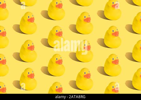 Rubber duck seamless pattern on yellow background minimal creative concept. Stock Photo