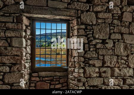 View through a window of the Eilean Castle on Loch Duich, Scotland, United Kindom Stock Photo