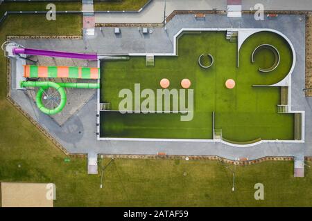 Abstract mixed shapes of top down view on closed swimming pool in aquapark. Stock Photo