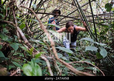 Trekking with a  guide in Knuckels range mountains in Sri Lanka Stock Photo