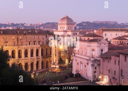 Rome, Italy - Jan 2, 2020: Theater of Marcellus or Teatro di Marcello, Temple of Apollo Sosianus, Church of Santa Maria in Campitelli and synagogue, R Stock Photo