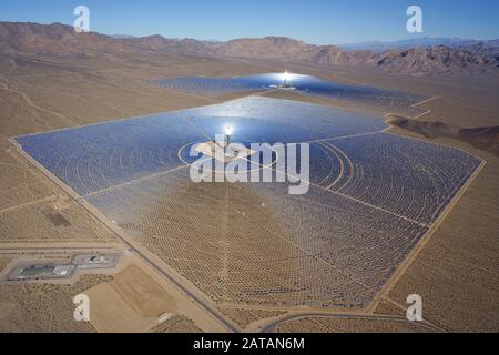 AERIAL VIEW. Ivanpah Solar Electric Generating System (world's largest concentrated solar power plant as of 2018). Mojave Desert, California, USA.