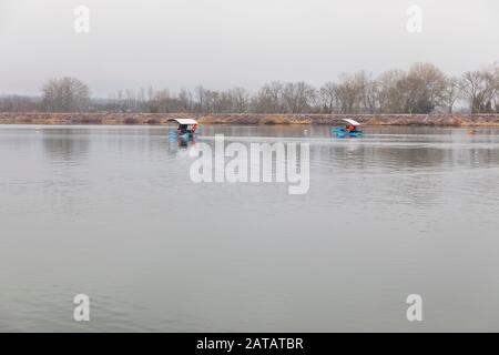 Gabala, Azerbaijan - January 20, 2020: People boating on Lake Nohur Stock Photo