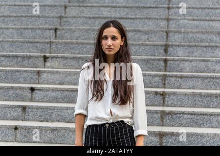 Young Middle Eastern Beauty Looking Away With Neutral Facial Expression Stock Photo