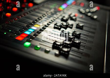 Recording studio equipment. Professional audio mixing console. Stock Photo