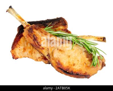Two grilled tomahawk pork chops isolated on a white background Stock Photo
