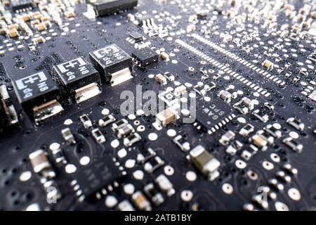 close-up of electronic circuit board with processor, Fragment of the electronic circuit - computer board with chips and components Stock Photo
