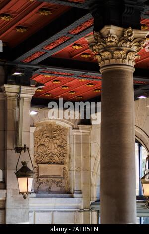 Red ceiling of the train station Saint Lazare in Paris Stock Photo