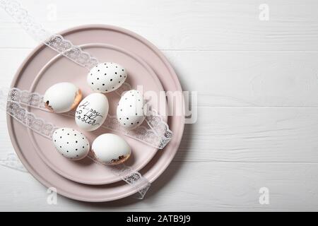 Easter eggs on a plate. Easter. Place for text Stock Photo