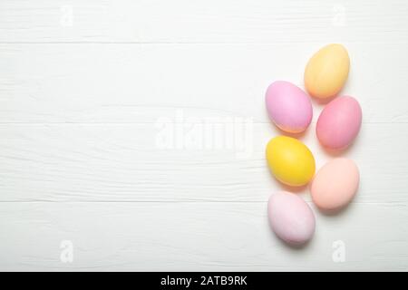 Multi-colored Easter eggs on a white background. With place for text. Stock Photo