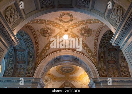 WASHINGTON - APRIL 12, 2015: Hallway and ceiling in the Library of Congress. The library officially serves the U.S. Congress.