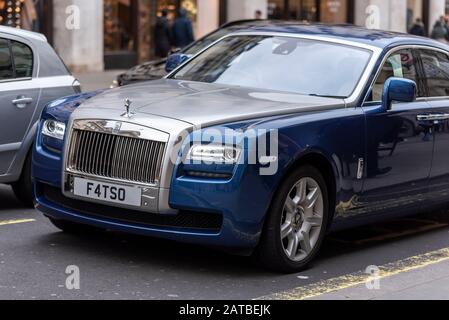 Rolls Royce car with special number plate FATSO, F4 TSO, driving in London, UK. Cherished, personalised registration plate. Fat cat limousine Stock Photo